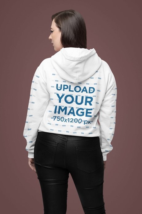 Back-View Mockup Featuring a Rocker Woman Wearing a Gildan Pullover Hoodie 