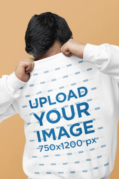 Mockup of a Man Hiding His Face on His Gildan Crewneck Sweatshirt