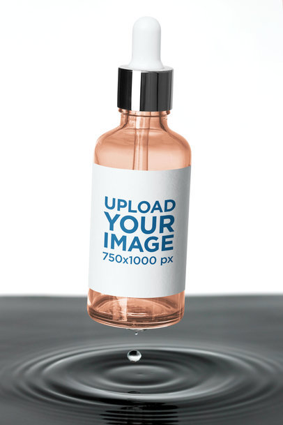 Mockup of a Skincare Dropper Bottle Featuring Water