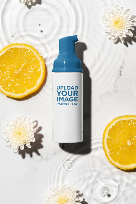 Cleanser Bottle Mockup Featuring Flowers and Orange Slices