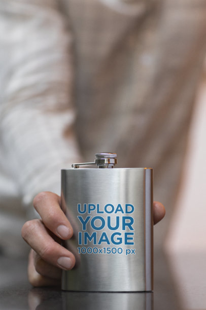 Mockup of a Man Holding an Aluminum Flask at a Wedding