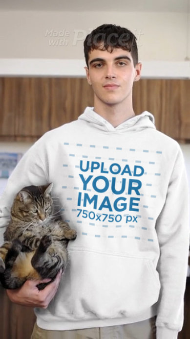 Gildan Pullover Hoodie Video Featuring a Man Carrying a Cat