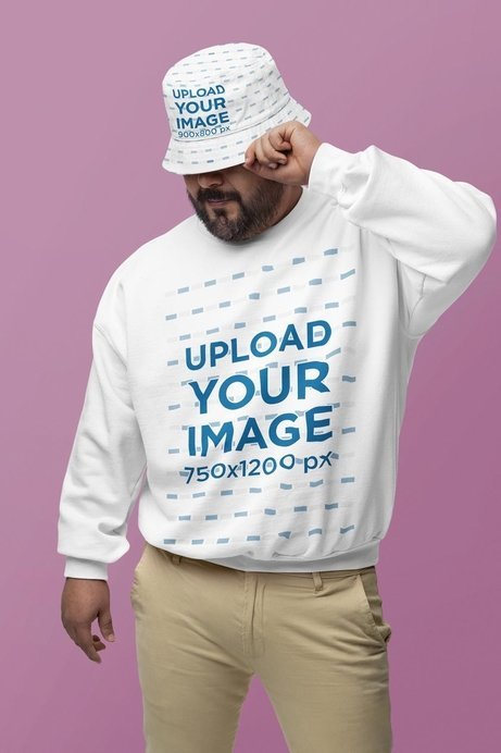 Gildan Sweatshirt Mockup of a Bearded Man With a Bucket Hat in a Studio