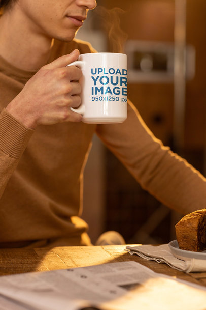 Mockup of a Man Grabbing a 15 Oz Coffee Mug