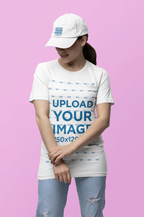 Bella Canvas Tee Mockup of a Woman Smiling With a Dad Hat Posing in a Studio