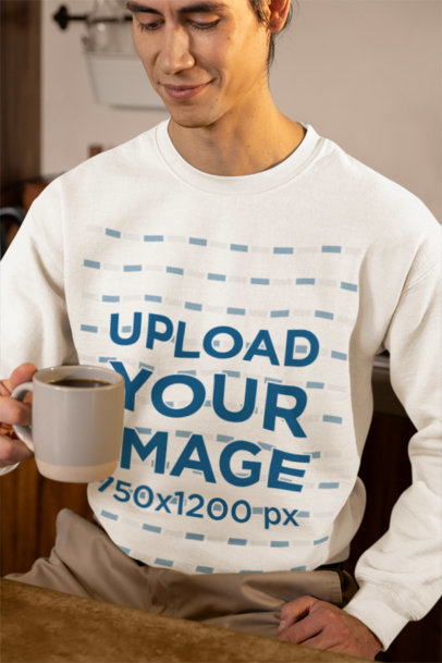 Gildan Sweatshirt Mockup of a Smiling Man With a Cup of Coffee in a House
