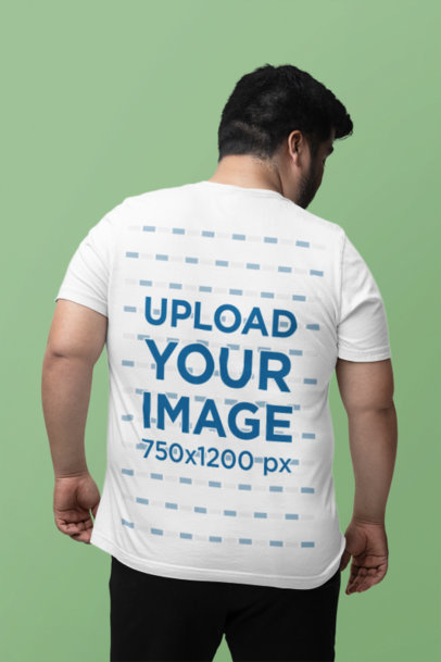 Back-View Bella Canvas T-Shirt Mockup Featuring a Man Standing Against a Colorful Background