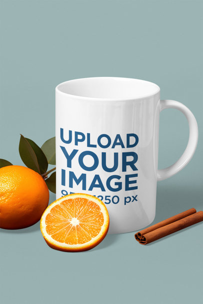 Mockup of an AI-Generated Coffee Mug Placed Next to Oranges and Cinnamon m36597