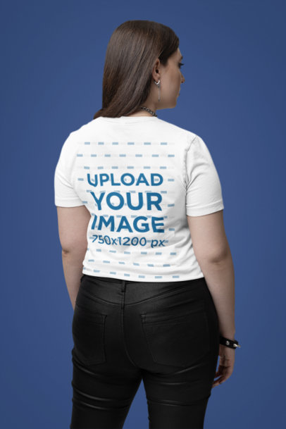 Back-View Mockup of a Woman Wearing a Bella Canvas T-Shirt in a Studio