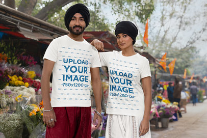 Scott International T-Shirt Mockup Featuring a Man and a Woman With Turban Standing in the Street m38681