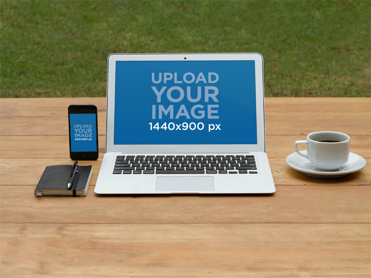 Digital Mockup Featuring a MacBook and an iPhone Placed on a Wooden Table