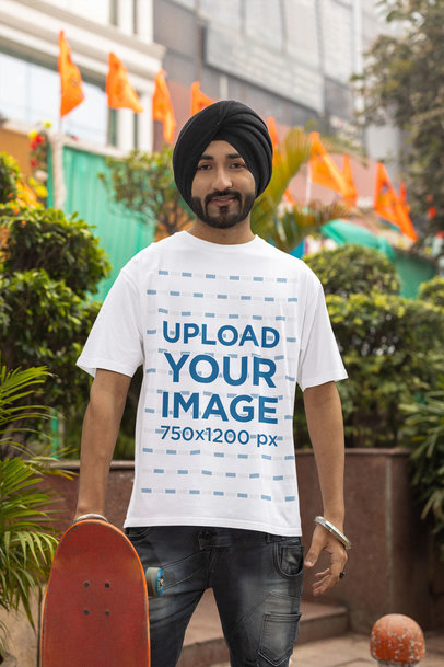 Mockup of a Bearded Skater Wearing a Crewneck T-Shirt and a Turban