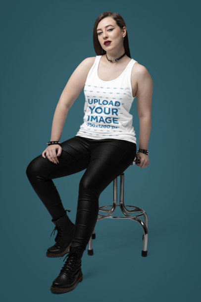 Bella Canvas Tank Top Mockup of a Woman Sitting on a Stool in a Studio