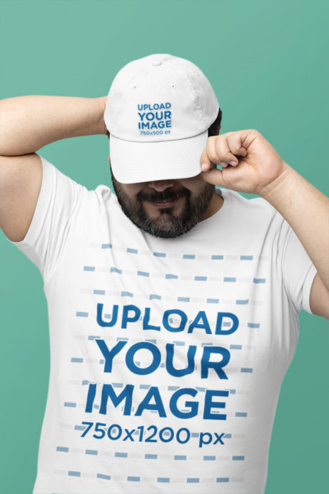 Bella Canvas T-Shirt Mockup of a Bearded Man Putting on His Dad Hat