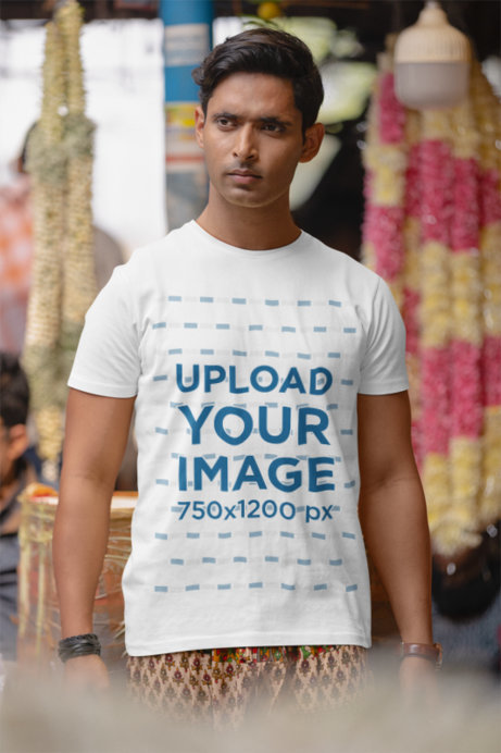 Scott International T-Shirt Mockup of a Man Standing in a Market