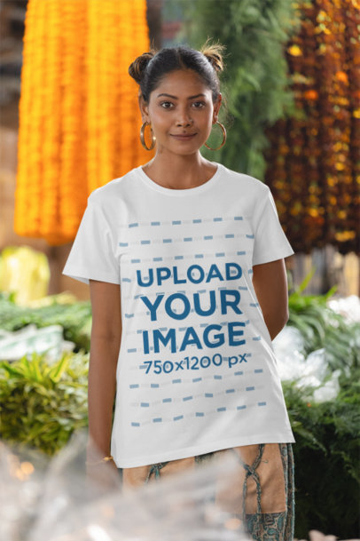 Mockup of a Happy Woman Wearing a Scott International Crewneck T-Shirt at a Market