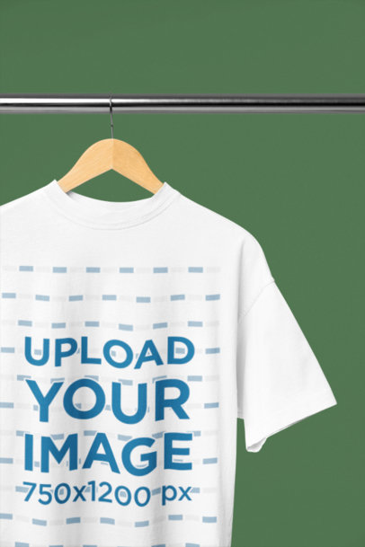 Oversized Round-Neck T-Shirt Mockup Featuring a Wooden Hanger