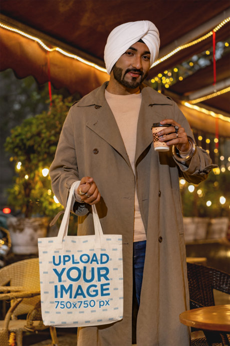 Mockup of a Man with a Turban Carrying a Tote Bag and a Coffee Cup