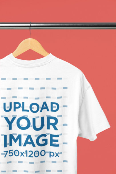 Mockup of the Back-View of an Oversized T-Shirt Placed on a Wooden Hanger
