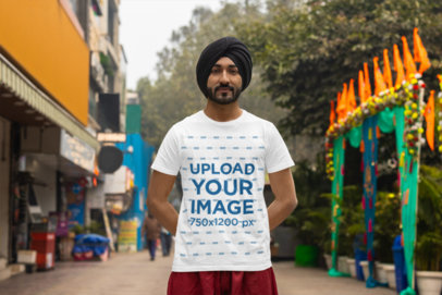 Mockup of a Bearded Man with a Turban Wearing a Scott International T-Shirt