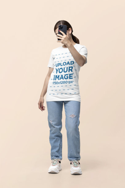Bella Canvas T-Shirt Mockup Featuring a Woman Covering Her Face With a Phone  m38534