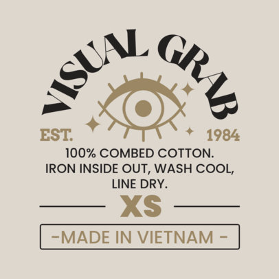 T-Shirt Label Design Maker for an XS Garment With an Eye Icon 6539