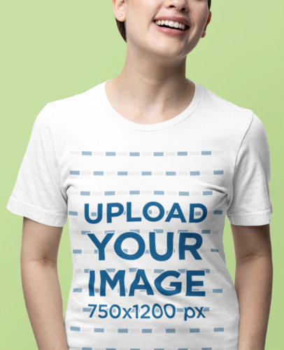 Bella Canvas T-Shirt Mockup of a Smiling Cropped-Face Woman Standing Against a Colorful Backdrop m38537