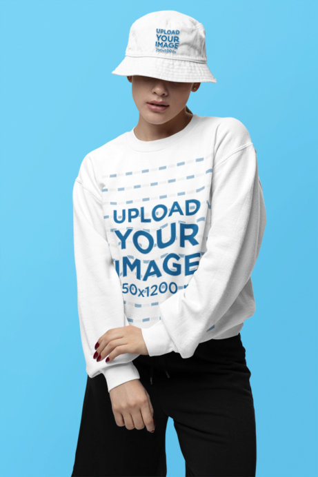 Bucket Hat Mockup Featuring a Serious Woman Wearing a Gildan Sweatshirt in a Studio