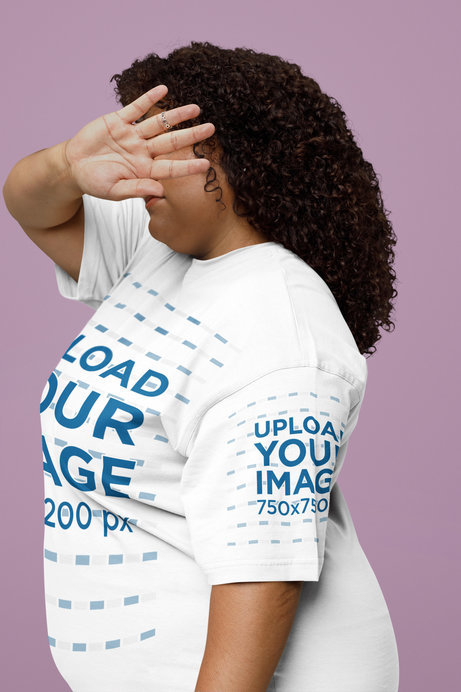 Oversized T-Shirt Mockup of a Curly-Haired Woman Covering Her Face