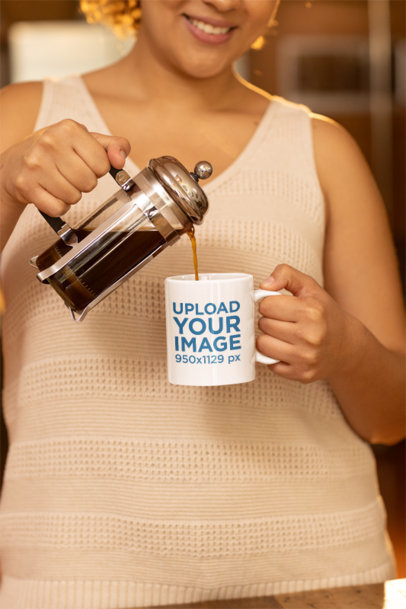 Mockup of a Smiling Cropped-Face Woman Serving Herself Coffee in a Mug