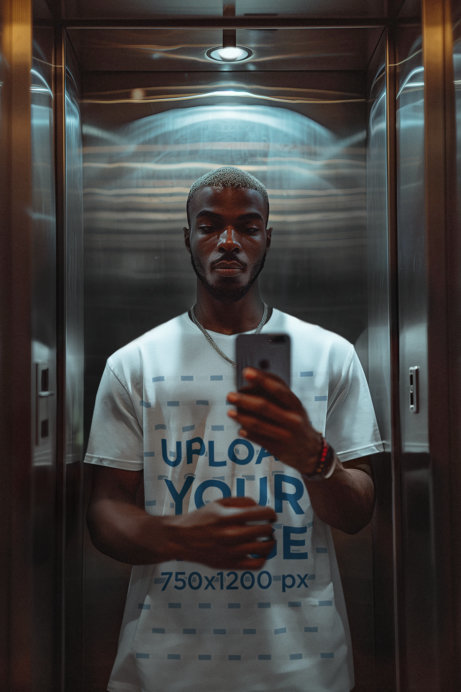 AI-Generated T-Shirt Mockup of a Man Taking a Selfie in an Elevator