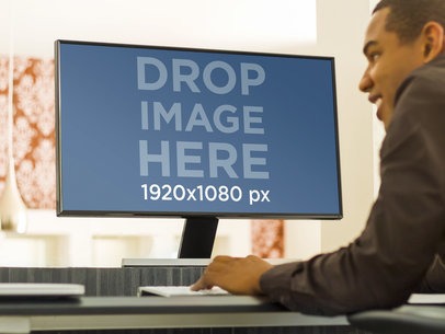 Young Man Working on Desktop Samsung PC