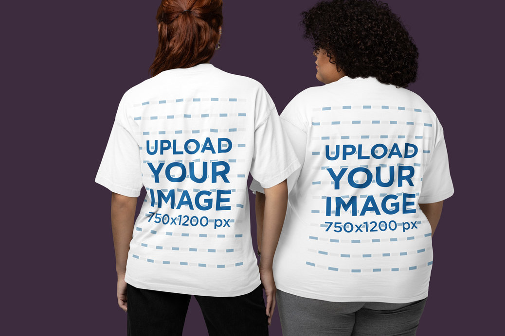 Back-View Oversized T-Shirt Mockup Featuring Two Women Posing in a Studio