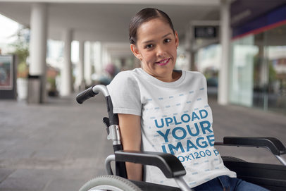 Round Neck Tee Mockup Featuring a Woman Sitting on a Wheelchair