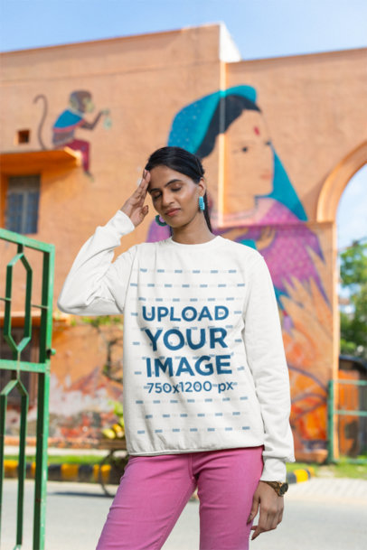 Sweatshirt Mockup of a Woman Touching Her Head with Her Hand
