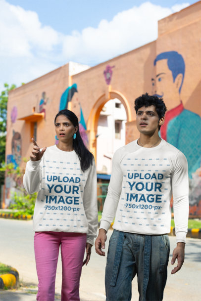 Sweatshirt Mockup Featuring a Man and a Woman Looking at Something in Disbelief m39191