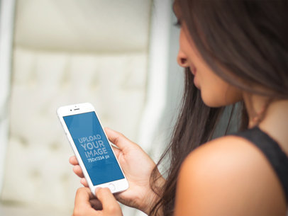 Mockup of a Lady Using her White iPhone 7 at Home