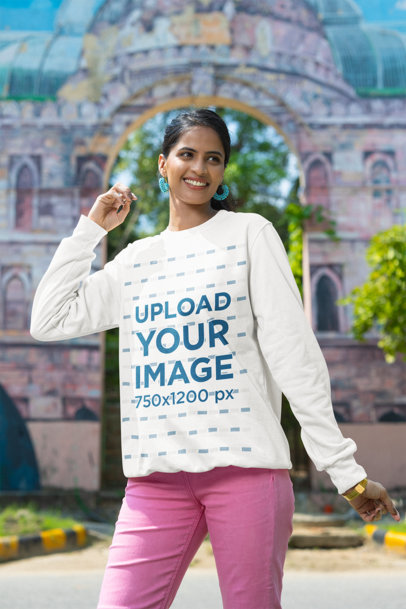 Rounded-Neck Sweatshirt Mockup of a Joyful Woman Posing on the Street m39285