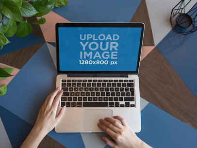 MacBook Mockup on a MultiColor Table a21510