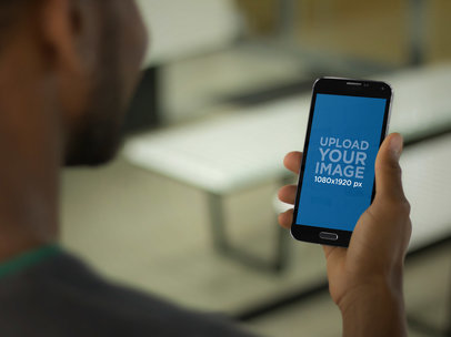 Android Mockup Young Man In Magazine Shop Using His Smartphone