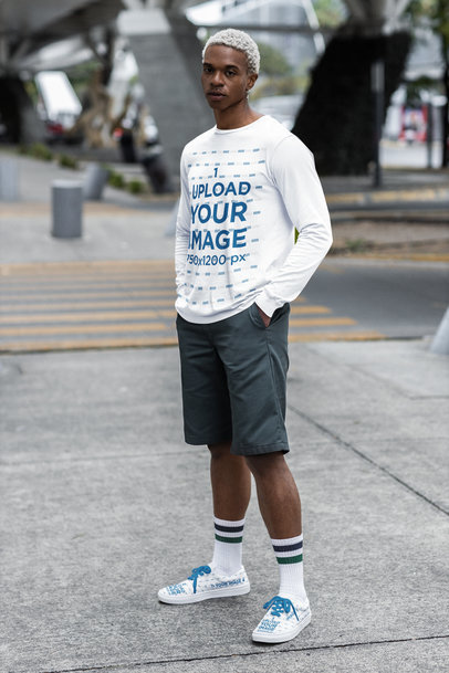 Mockup of a Man Wearing a Bella Canvas Long Sleeve Tee and Low Sneakers m38303