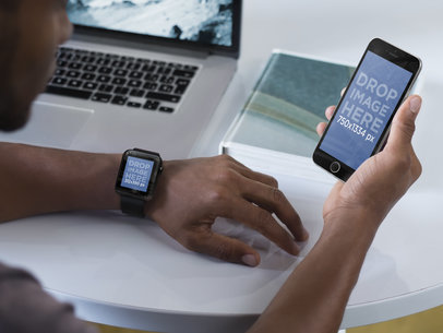 Mockup of Young Man Wearing an Apple Watch and Using an iPhone 6