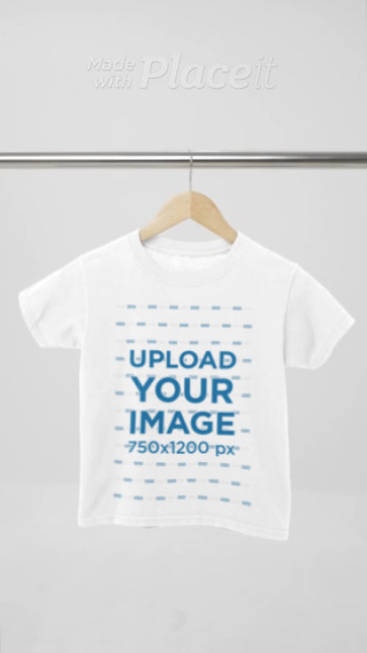 Video of a Round-Neck Gildan T-Shirt Placed on a Nice Wooden Hanger