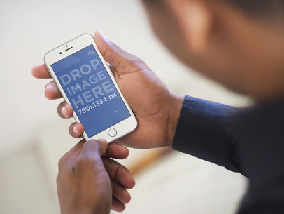 Mockup Template of Executive Man Using a White iPhone 6