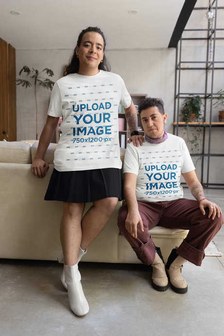 Bella Canvas Tee Mockup of Two Smiling Persons Posing in a Living Room