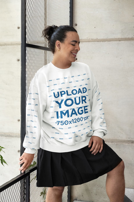 Mockup of a Joyful Person Wearing a Gildan Sweatshirt and a Skirt