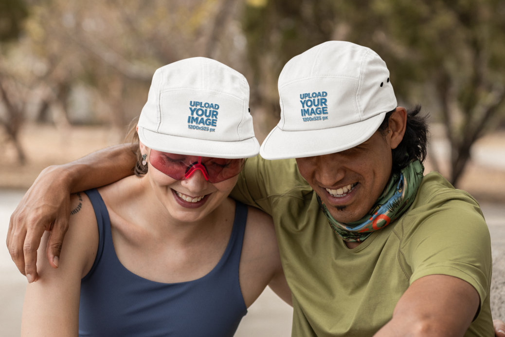Yupoong Panel Hat Mockup of a Happy Man and a Woman in a Running Streetstyle