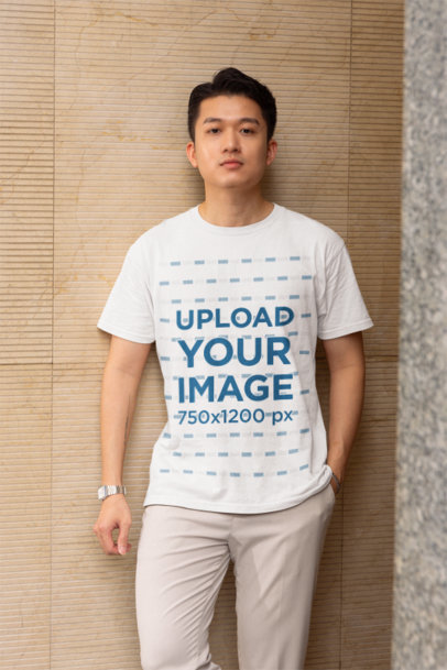 Gildan Round-Neck Tee Mockup of a Man With a Serious Look and an Arm Tattoo