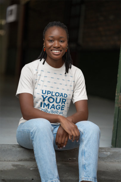 Bella Canvas T-Shirt Mockup of a Happy Woman Sitting on the Floor