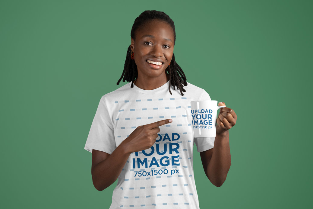 Bella Canvas T-Shirt Mockup of a Happy Woman Pointing at Her Coffee Mug